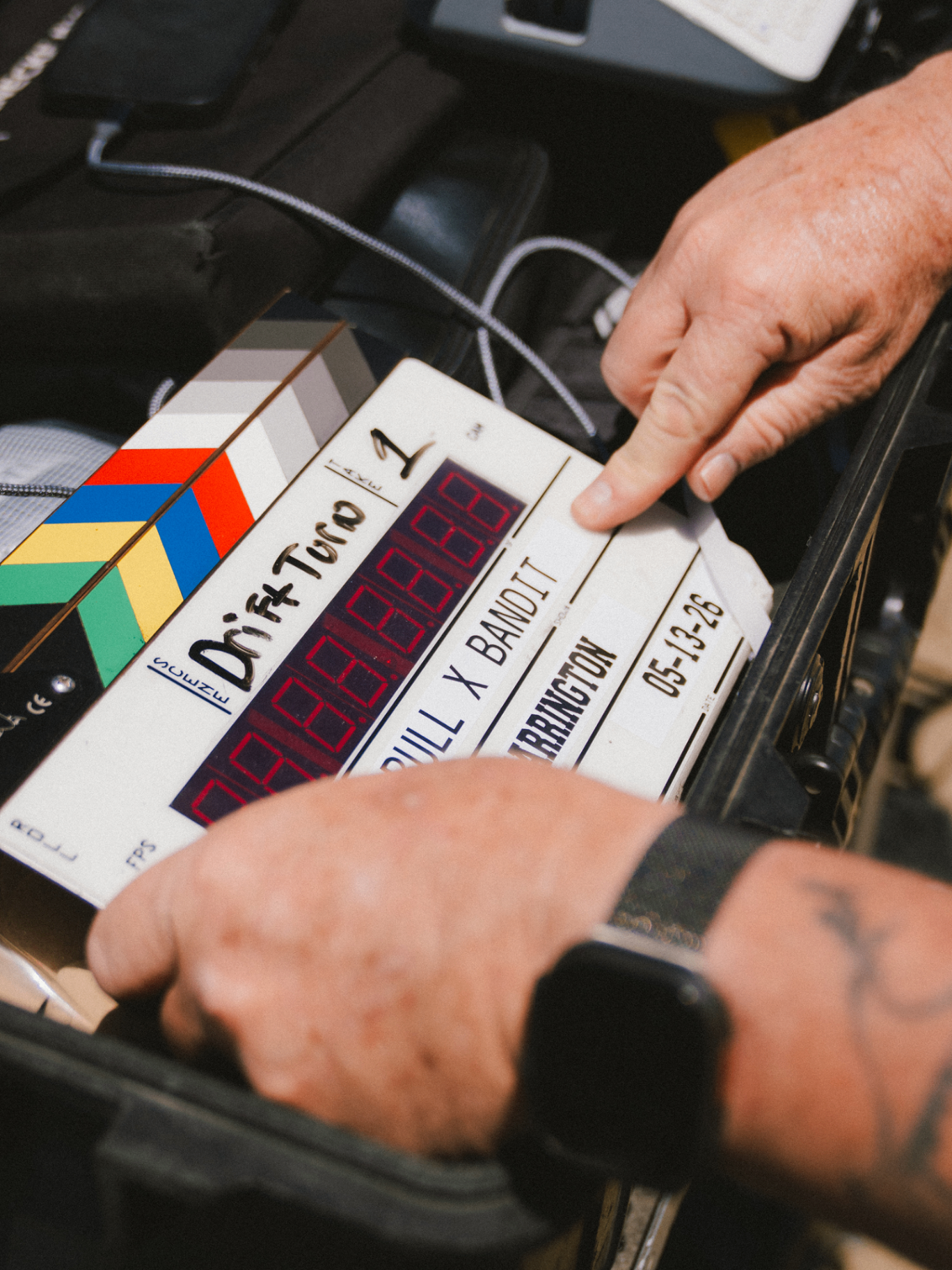 Close-up of a Drift Toro clapperboard for Red Bull x Bandit being held on set